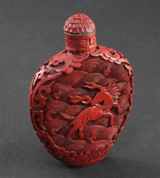 A Chinese cinnabar lacquer flask shaped snuff bottle, 1800-1900, 7.5cm